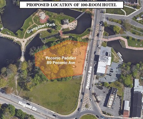 Proposed location of 100-room hotel. 