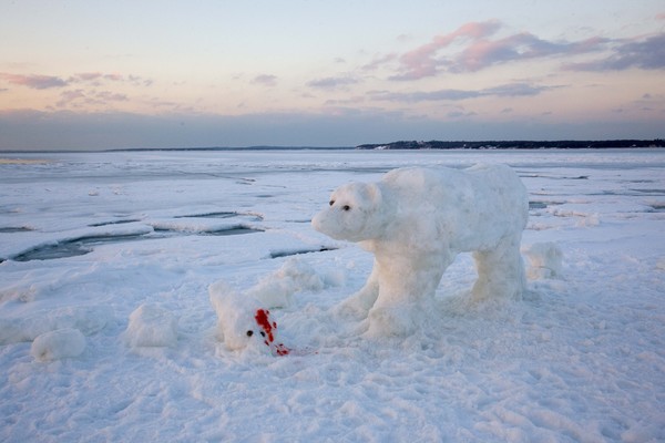  James Henry and Scott Partlow sculpted this grizzly polar bear scene on Long Beach in Sag Harbor this weekend.