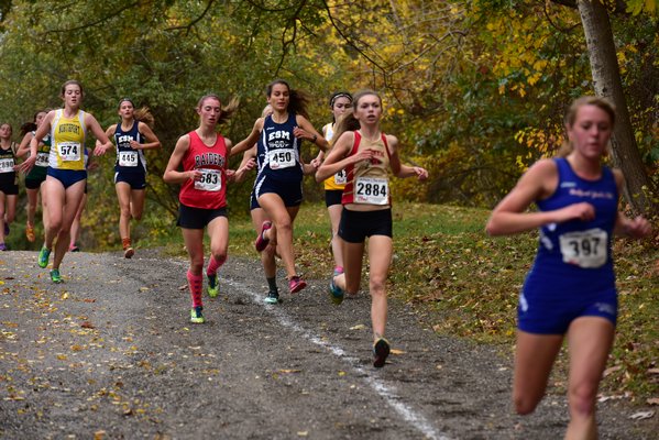 ESM senior Ashley Schafer makes a move around a pack of runners. DREW BUDD