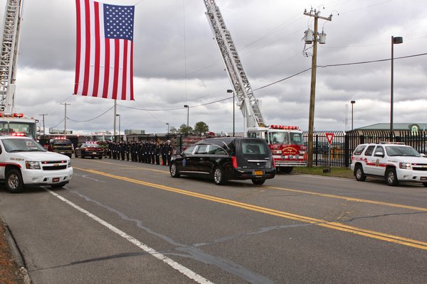 The body of 31-year-old Air National Guard hero serviceman Sgt. Louis Bonacasa of Coram landed at Gabreski Airport in Westhampton Beach on Thursday morning. He was one of six service members killed in a suicide attack in Afghanistan. He was honored by numerous fire departments lining County Road 31 with flags and standing at attention. His funeral will be held Saturday morning at New Beginnings Christian Center in Coram followed by burial a