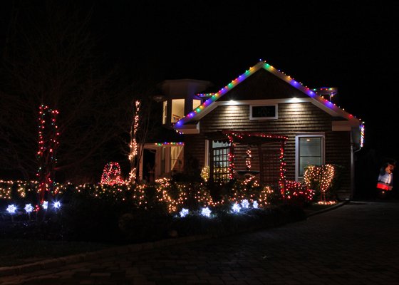 Most festive went to the LeBruns at 85 Oak Street in the Village of Westhampton Beach Holiday Lighting Contest. Neil Salvaggio