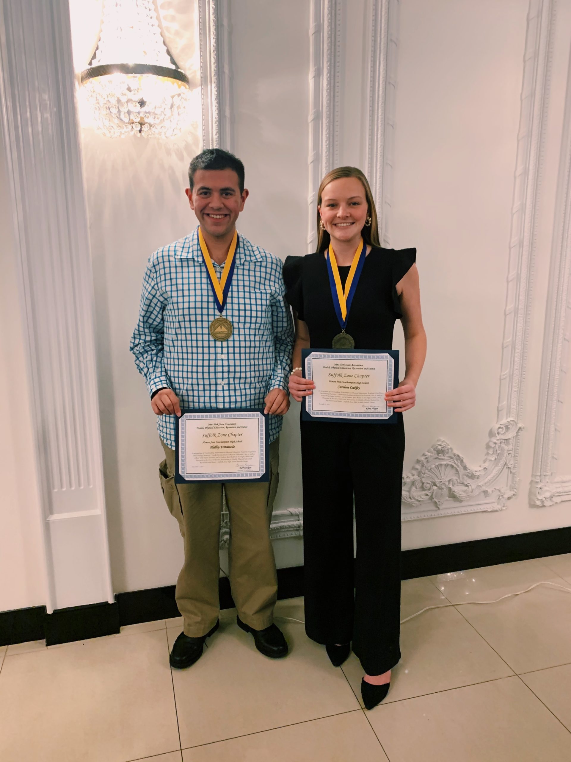 Southampton High School seniors Phillips Ferraiuolo and Caraline Oakley were honored by the New York State Association for Health, Physical Education, Recreation and Dance on December 3 as winners of the Suffolk Zone Student Leadership Award. The pair were selected based upon their excellence in physical education, leadership ability and service to the community.