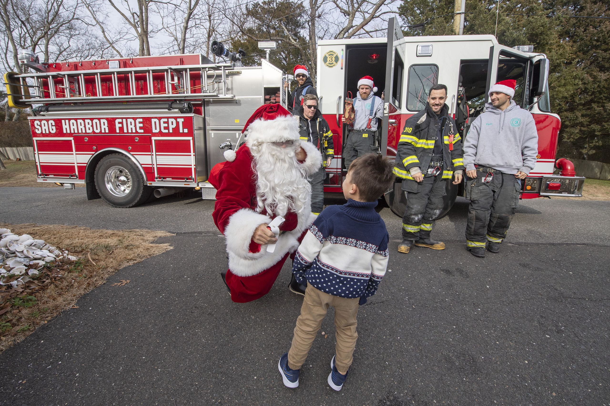 Santa visits with a young fan in North Haven on Saturday.