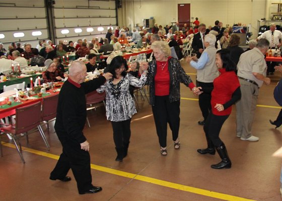 Senior citizens of Montauk in previous years enjoying the Montauk Fire Department and Montauk Lions Club annual holiday dinner.  PRESS FILE