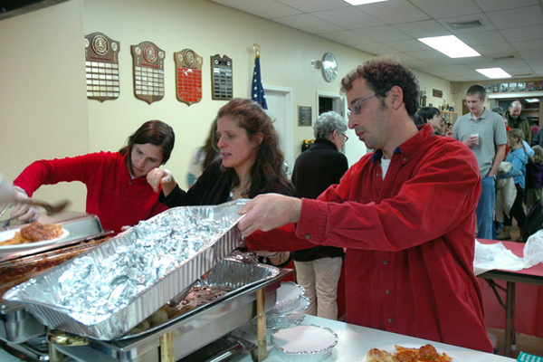  Joe Realmuto and Jennifer Futerman were kept busy serving meals at the Springs School PTA pasta dinner at the Springs Firehouse on Sunday.