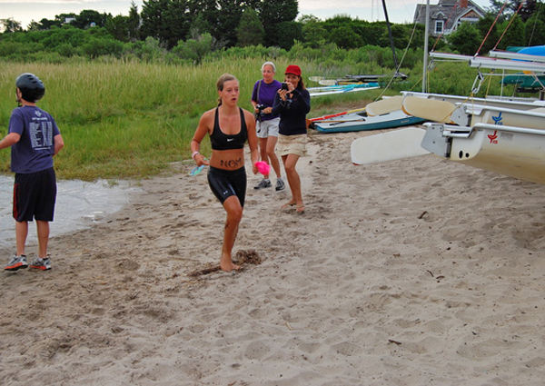 Participant Charlotte Detwiler prepares to start the second leg of the triathlon. Detwiler raised $2