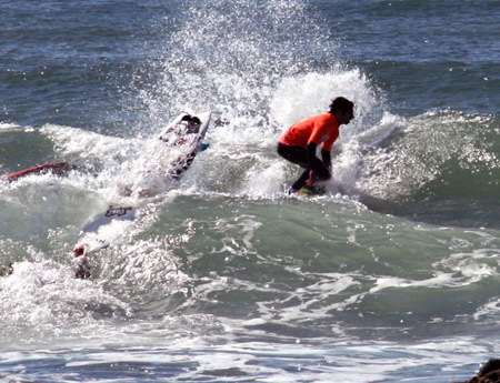 Surfers from local schools competed in a surfing competition sponsored by the Surfrider Foundation at Ditch Plains Beach in Montauk on Saturday. KYRIL BROMLEY