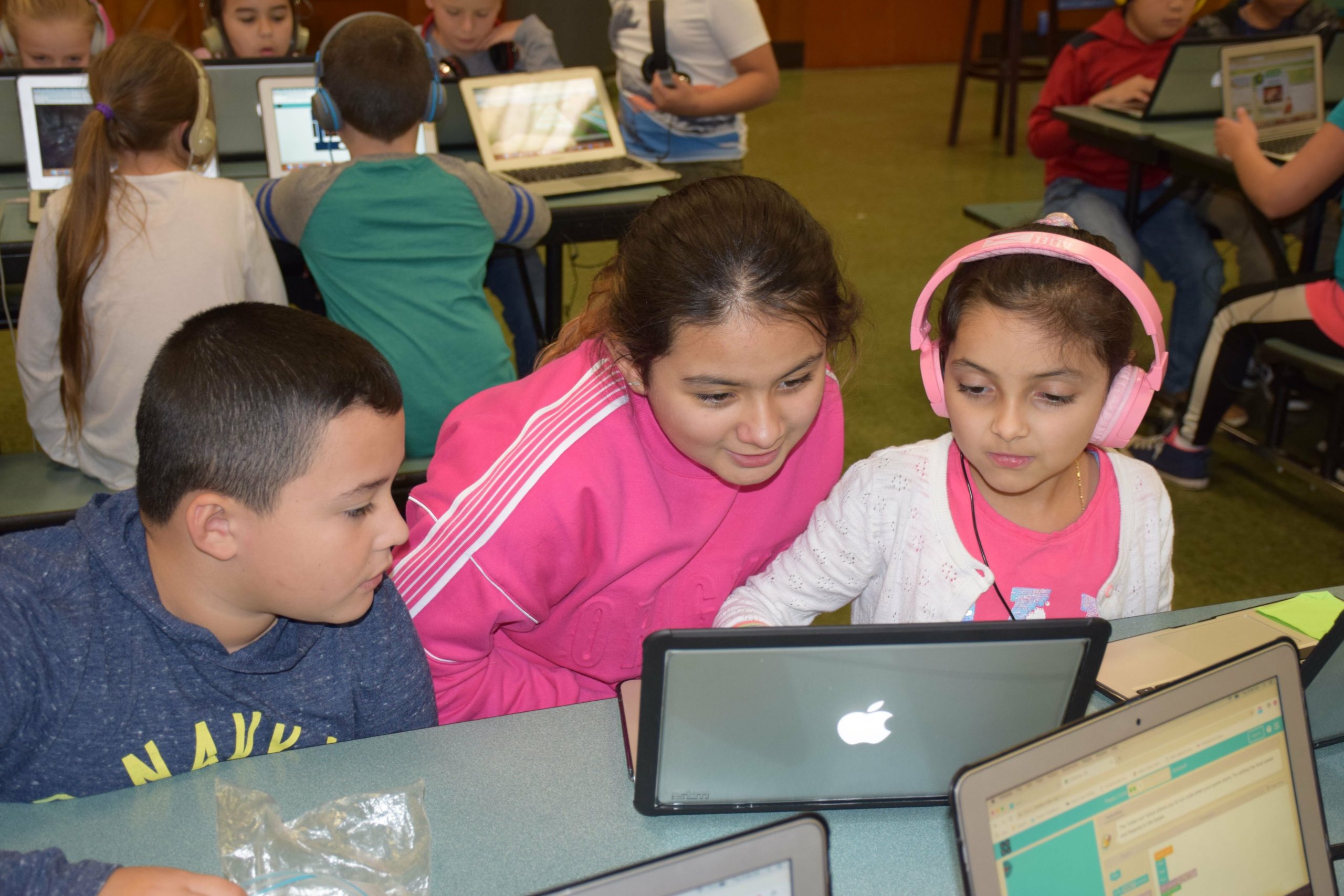 Westhampton Beach Elementary School students, including, from left, Brian Cruz Cordova, Fabiana Rodriquez Flores and Kenna Rogue Gutierrez, participated in an Hour of Code during Computer Science Education Week. 