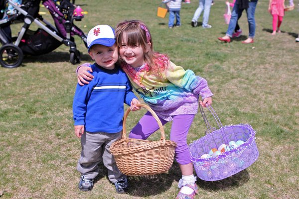 Emma Stork tries to keep her ears on as she searches for eggs at the Greater Westhampton Chamber of Commerce’s 18th annual Egg Hunt to begin on the Great Lawn on Saturday