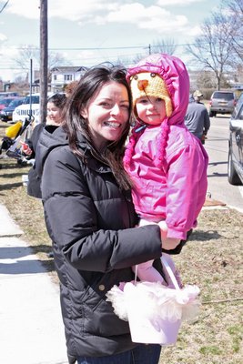  Delila and Julia Kronimus filled their baskets at the Greater Westhampton Chamber of Commerce’s 19th annual Egg Hunt on Saturday