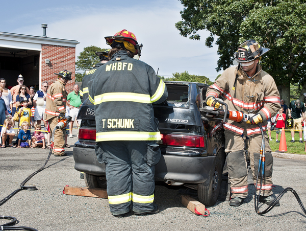 Members of the Westhampton Beach Fire Department demonstrate a car rescue using the jaws of life at the department's open house. COURTESY WHB FD 