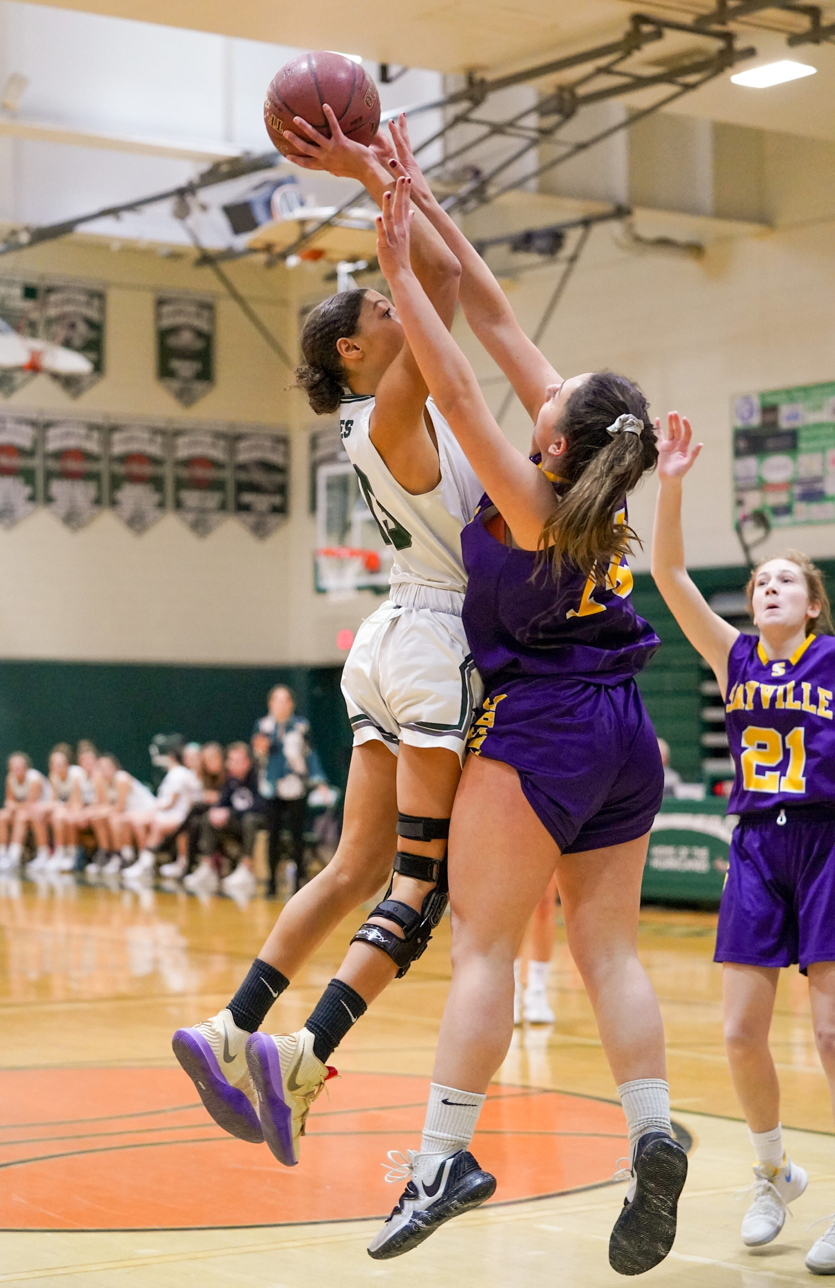 Westhampton Beach senior Layla Mendoza takes on a Sayville defender in the paint. She finished with 23 points and 10 rebounds.