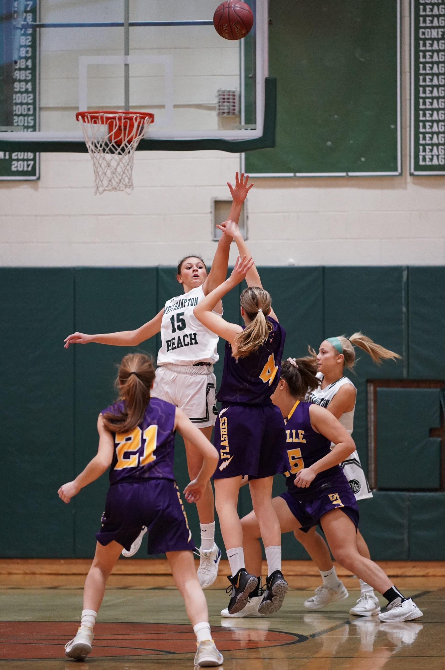 Westhampton Beach sophomore Olivia Rongo tries to block a shot.