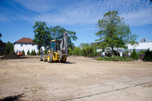 Dragonfly Landscape Design Ltd. along with the Department of Public Works begins working on the implementation of Glovers Park in the Village of Westhampton Beach.     GREG WEHNER