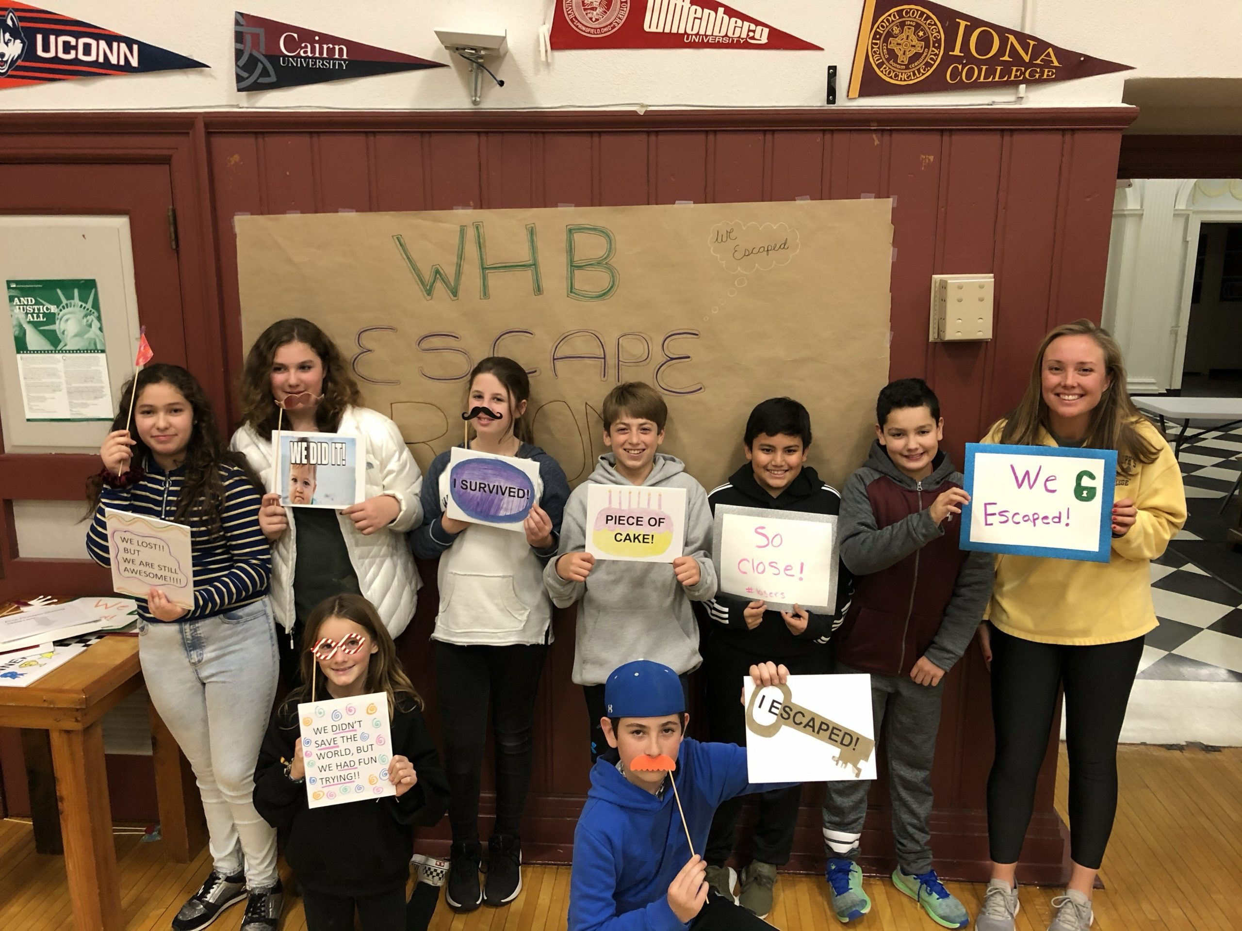 Eighth-graders in Kelly Russell’s critical literacy class at Westhampton Beach Middle School gave back to the district's Hurricane Foundation by organizing an escape room fundraiser on December 3. The inspiration for the event began in seventh grade, when the students learned about the United Nations Messengers of Peace program as part of their curriculum. Expanding on the lesson this year, they decided to organize a fundraiser for which they designed an escape room around the theme of “evil science lab.” Participants were given clues and moved through 10 rooms to solve riddles, find a blueprint and race back to the school’s cafeteria to crack the final code. The event also included a student-run bake sale and a photo booth featuring various props, ultimately raising more than $800.