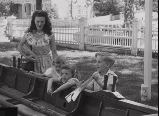 A young Jan Harboy at the whaleboat at the Sag Harbor Whaling Museum with his mother and sisters.  COURTESY NATIONAL ARCHIVES