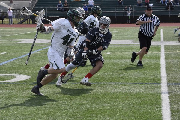 Westhampton Beach junior Dylan Laube brings the ball into his offensive end. DREW BUDD