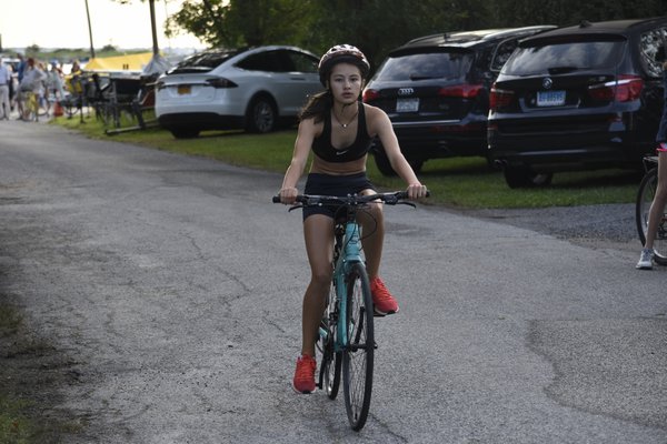 A girl starts the 7-mile bike ride. DREW BUDD