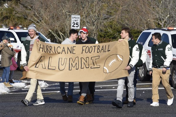 A handful of alumni of the Westhampton Beach football team came out to take part in Saturday's parade. DREW BUDD