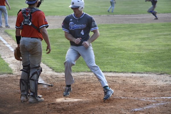 Gerard Sweeney (Lehigh) scores one of the two runs on Kyle Lagrutta's double in the top of the eighth inning. DREW BUDD
