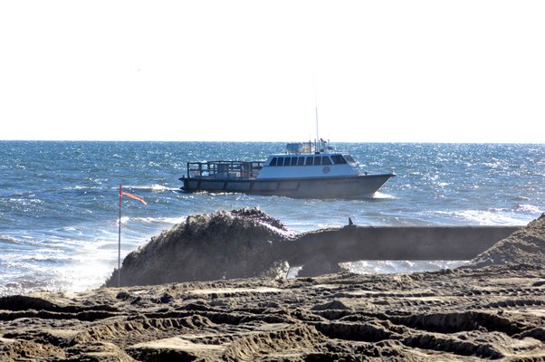 Dredging began just east of Scott Cameron Beach on Tuesday afternoon. DANA SHAW