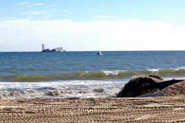 Dredging began just east of Scott Cameron Beach on Tuesday afternoon. DANA SHAW