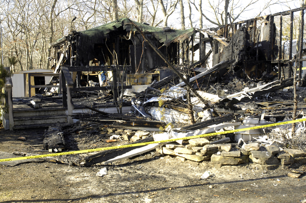 A mobile home was destroyed by fire on Sunday night at the Hampton Bays Mobile Home Park. DANA SHAW