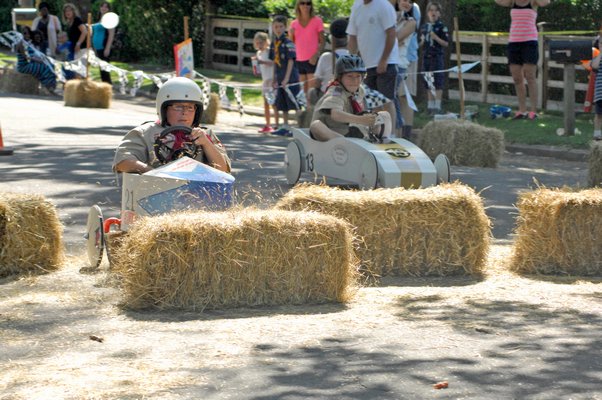 Andrew Schaefer crshes through the bales.