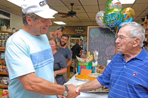 Governor Andrew Cuomo visits with Sal DeCarlo at Catena's.  DANA SHAW