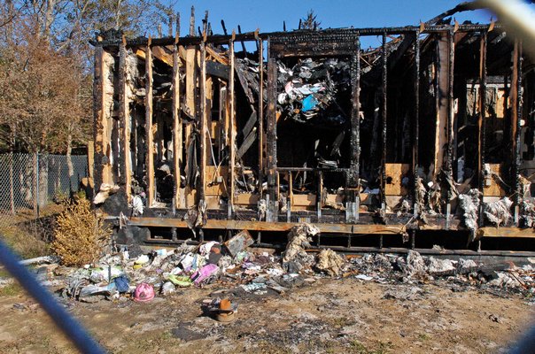 The fire that consumed the home the Collins family were living in and the home they were building destroyed everything including the vehicles.  DANA SHAW