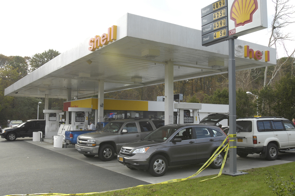 The Shell gas station in Hampton Bays was backed up on Montauk Highway and Canoe Place Road on Thursday afternoon with patrons fra