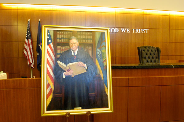 Judge Edward D. Burke Sr. at the unveiling ceremony of his portrait at the Supreme Court Building in Riverhead.  DANA SHAW