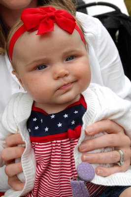 LIttle Lucy Maddox enjoys the parade.