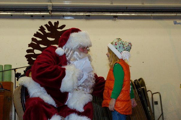 Santa chats with Finney Dianora-Brondal.