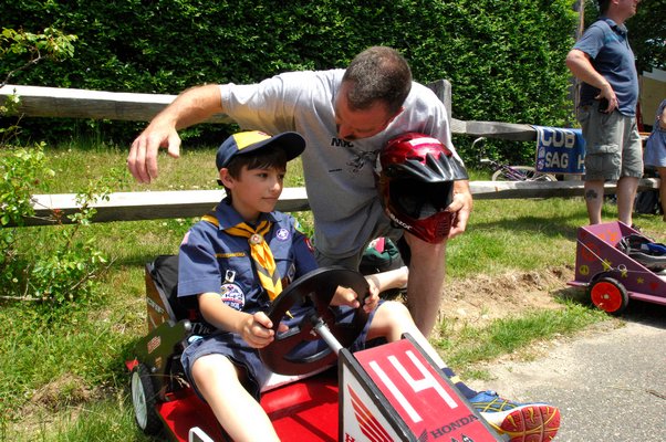  Rob at the Sag Harbor Scouts Soap Box Derby on Sunday.  DANA SHAW
