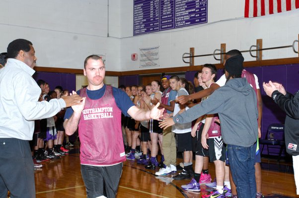 Mark Raynor is introduced at the basketball game on November 13.