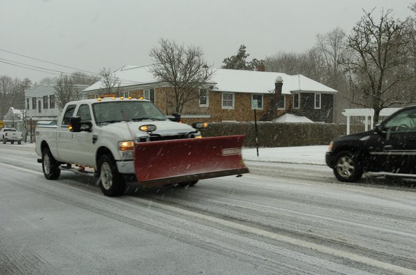 Plows were out in full force on Thursday morning as a winter storm bears down on the area.  DANA SHAW