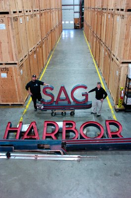The Sag Harbor Cinema sign is currently is being stored at Twin Forks Moving and Storage.  DANA SHAW