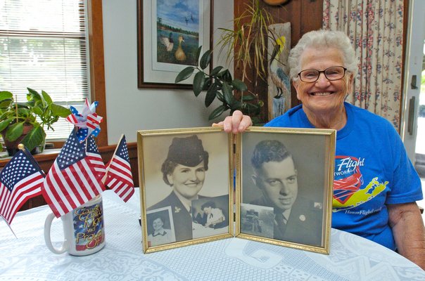 Fran Westerhoff with a photo of herself and her late husband