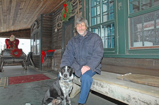 Jan Harboy with his dog Deke at the Annie Cooper Boyd House in Sag Harbor