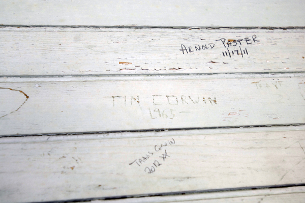 Tim Corwin carved his name in the clock tower in 1965 when he was just a boy.  DANA SHAW