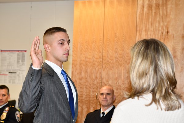 Officer Josiah Hoshyla is sworn in.