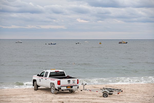 The seach for plane that crashed continues on Sunday in waters near the Surf Club in Quogue.  DANA SHAW