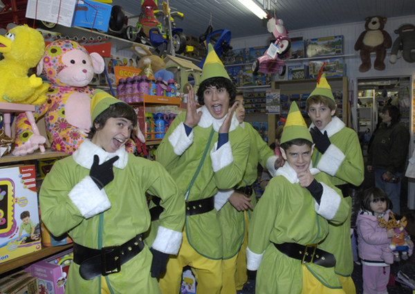 The elves check out the toys at Stevenson's Toys and Games.  DANA SHAW