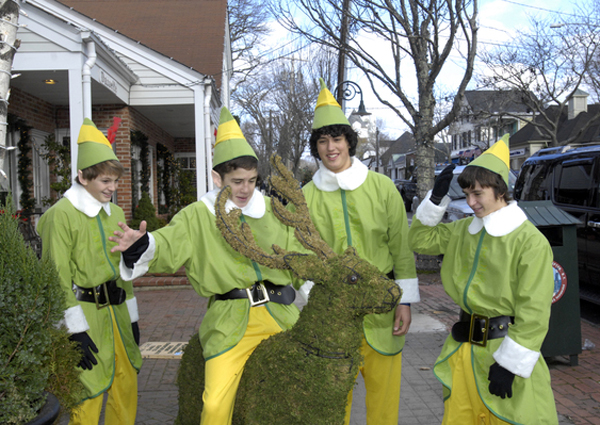 The elves in front of Topiarie Flower shop on Jobs Lane.    DANA SHAW