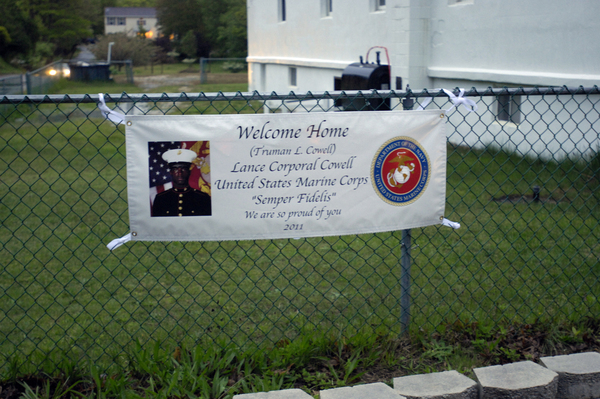 Marine Truman Cowell is welcomed by his cousin