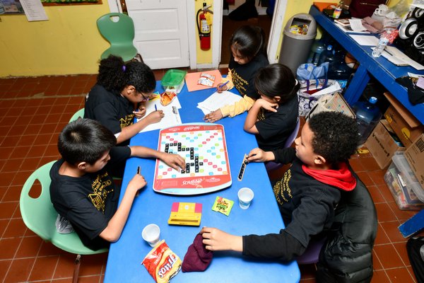 Members Bridgehampton Child Care & Recreational Center Scrabble team prepare for the North American School S