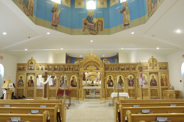 The inside of the Greek Orthodox Church. Pews
