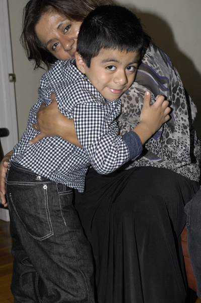 Patricia Vega and her son Ismael in their Hampton Bays home.   DANA SHAW
