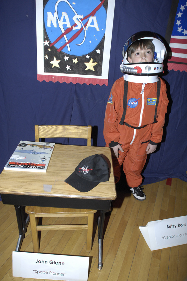 Andrew tilton as John Glenn.